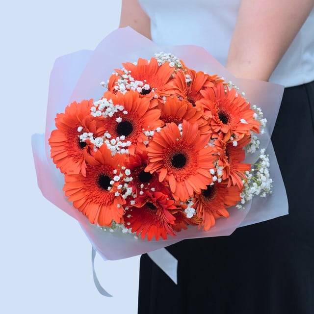 Bouquet "Dresle" with baby breaths and orange herberas