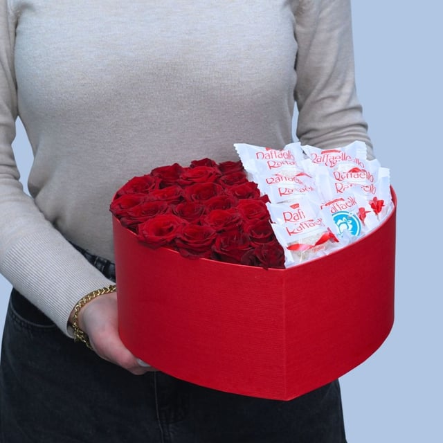Box with red roses and Raffaello