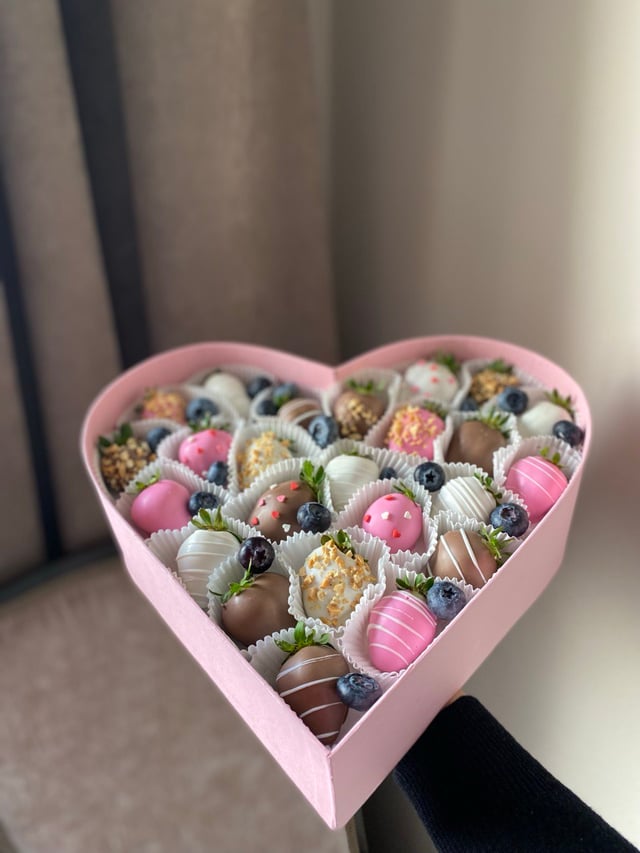 Strawberry set in a heart-shaped box