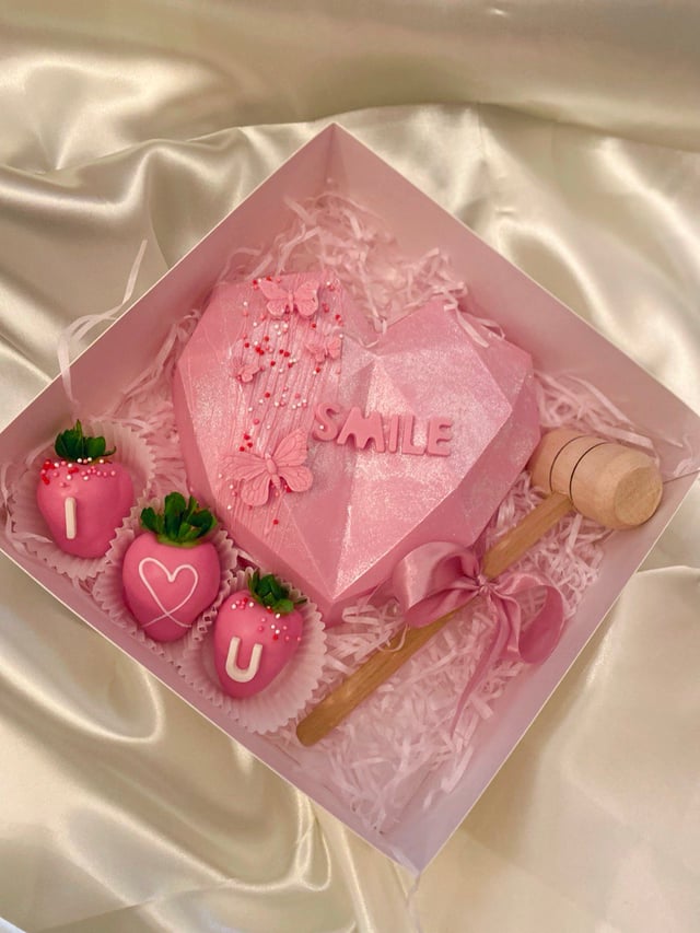 Broken heart filled with strawberries inside