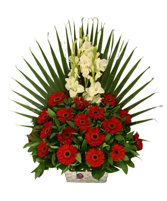Funeral flower basket with red gerberas